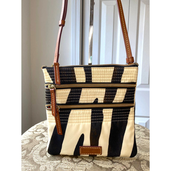 Dooney & Bourke Handbags - Dooney and Bourke triple zip Zebra print nylon crossbody handbag